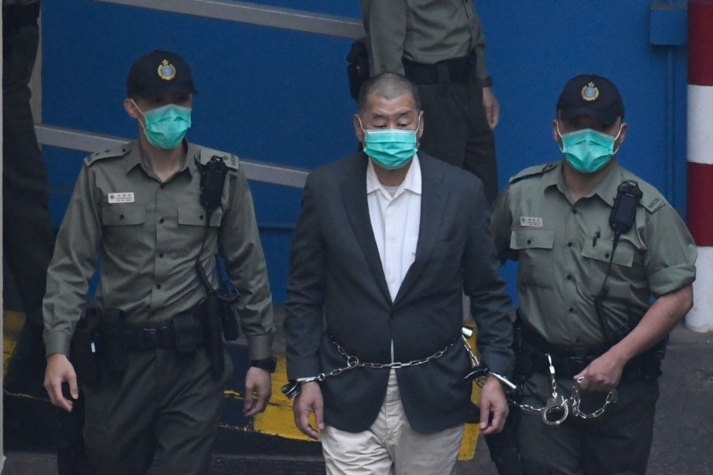 Alleged Hong Kong Crypto Swindler Tied to Singapore Money Laundering Syndicate